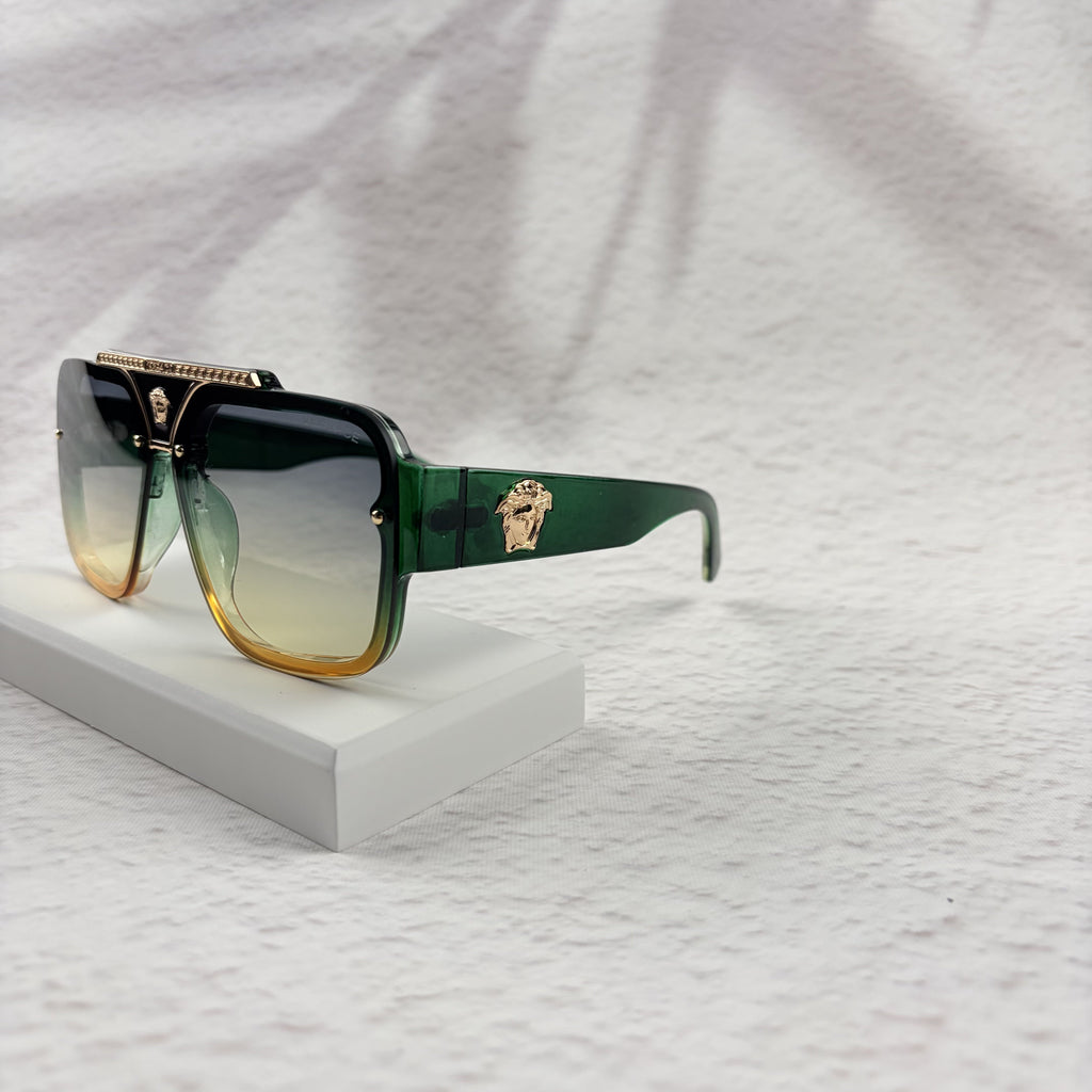 Geometric Gradient Sunglasses with Gold Accents for UV Protection