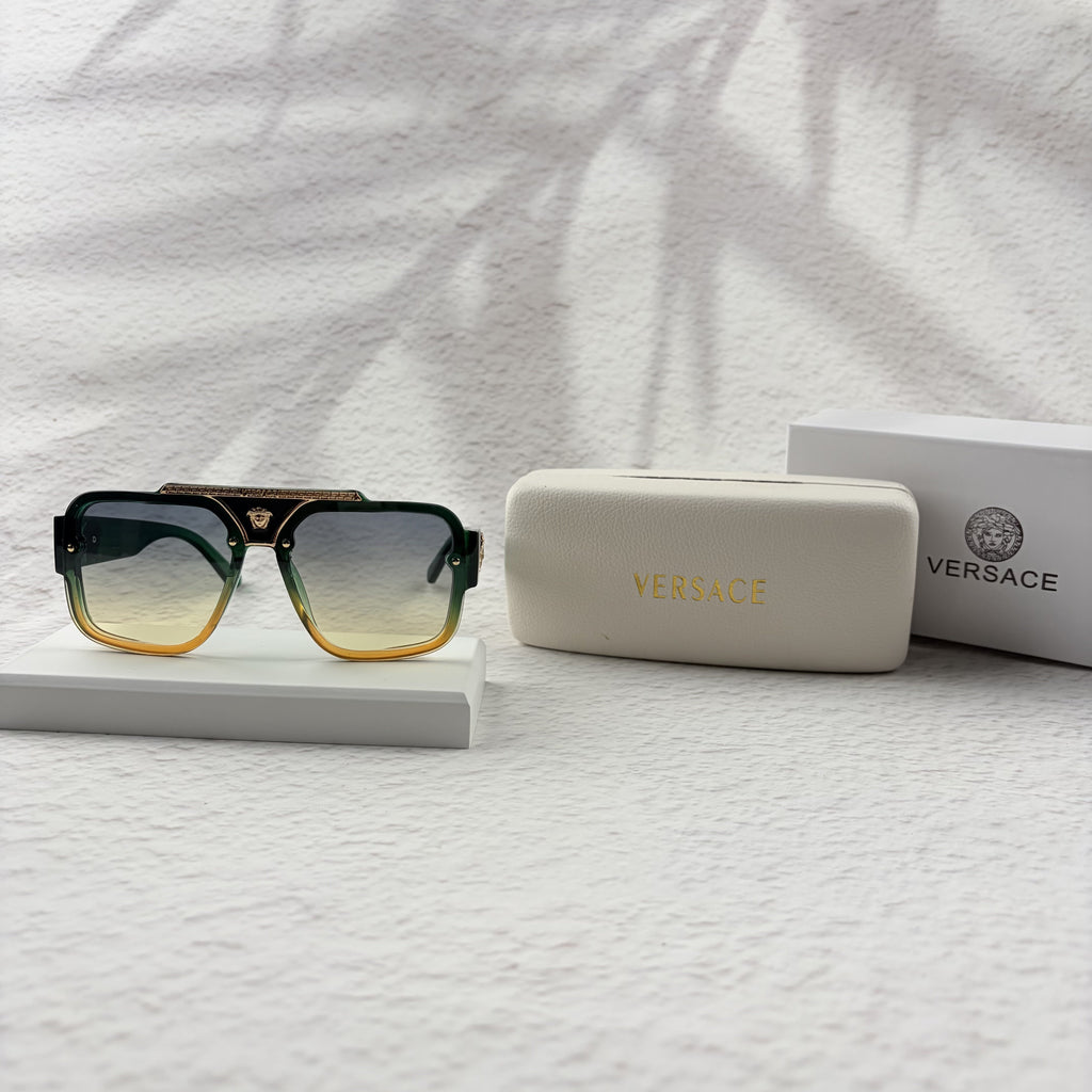 Geometric Gradient Sunglasses with Gold Accents for UV Protection