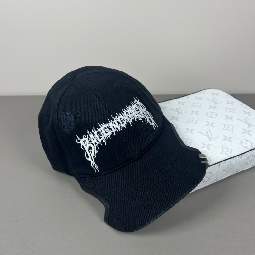 Black cotton cap with flame embroidery and notched brim