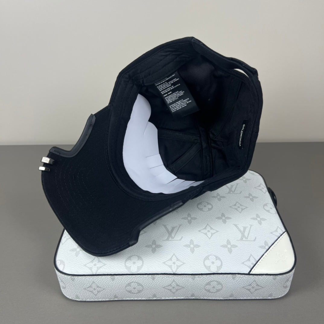 Black cotton cap with flame embroidery and notched brim