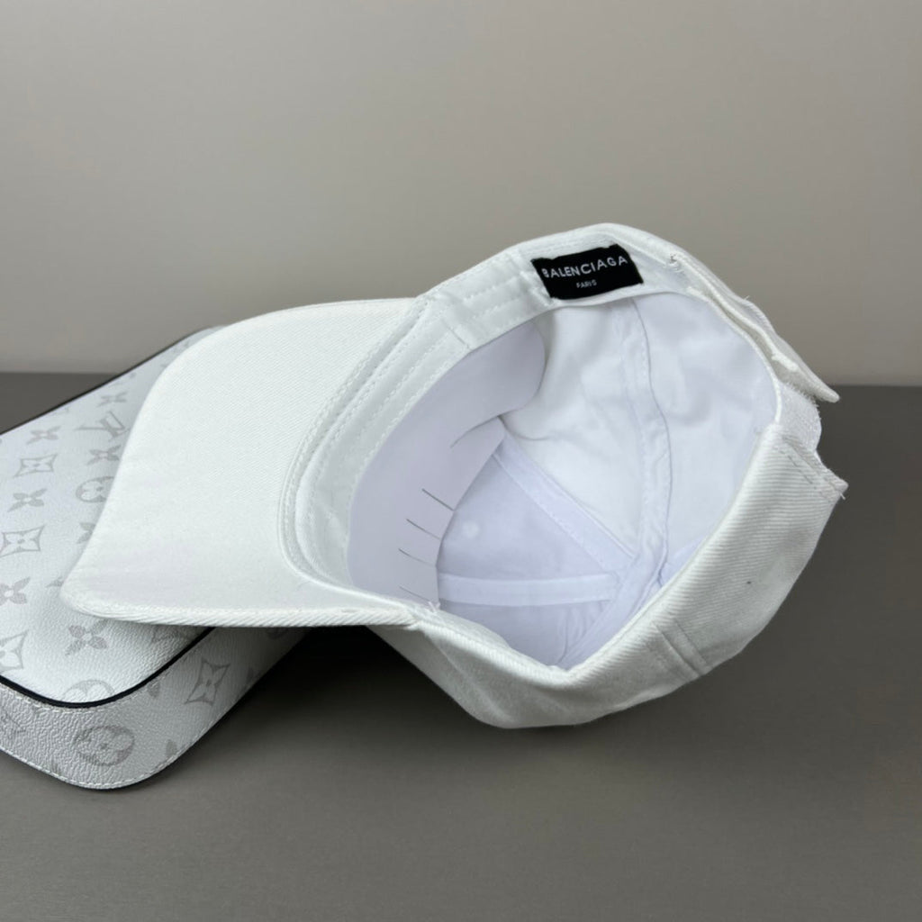 White cotton cap with graphic emblem and contrast brim embroidery