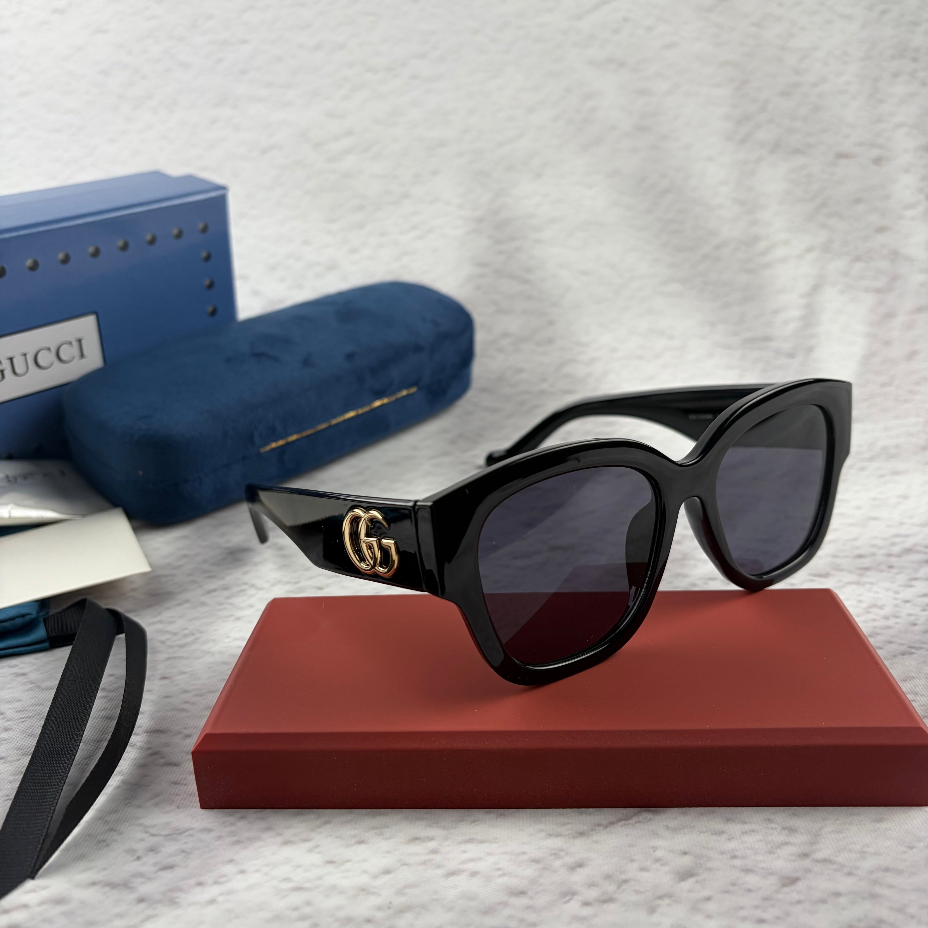 Classic Oversized Black Frame Sunglasses with Gold Accents