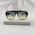 Geometric Gradient Sunglasses with Gold Accents for UV Protection