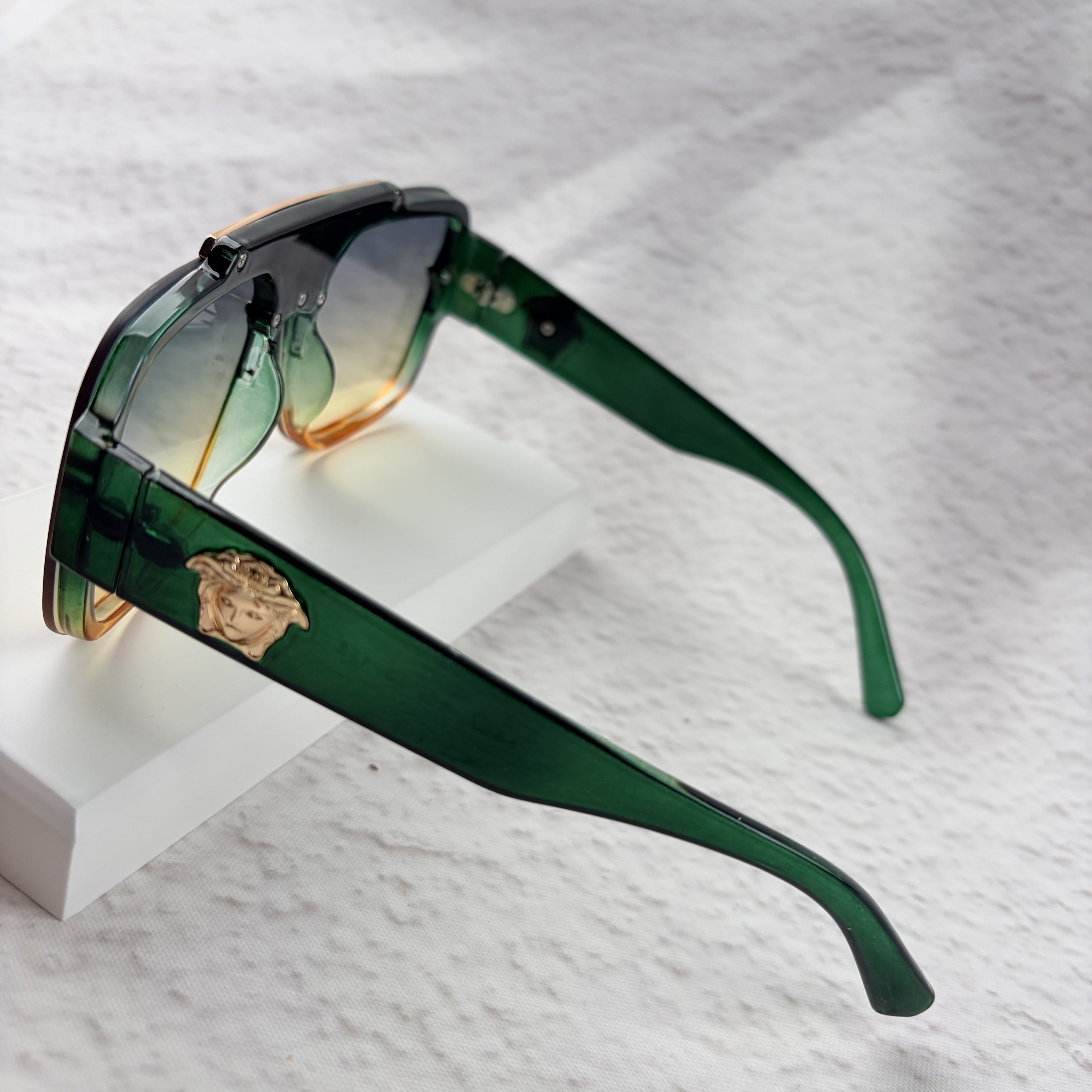 Geometric Gradient Sunglasses with Gold Accents for UV Protection